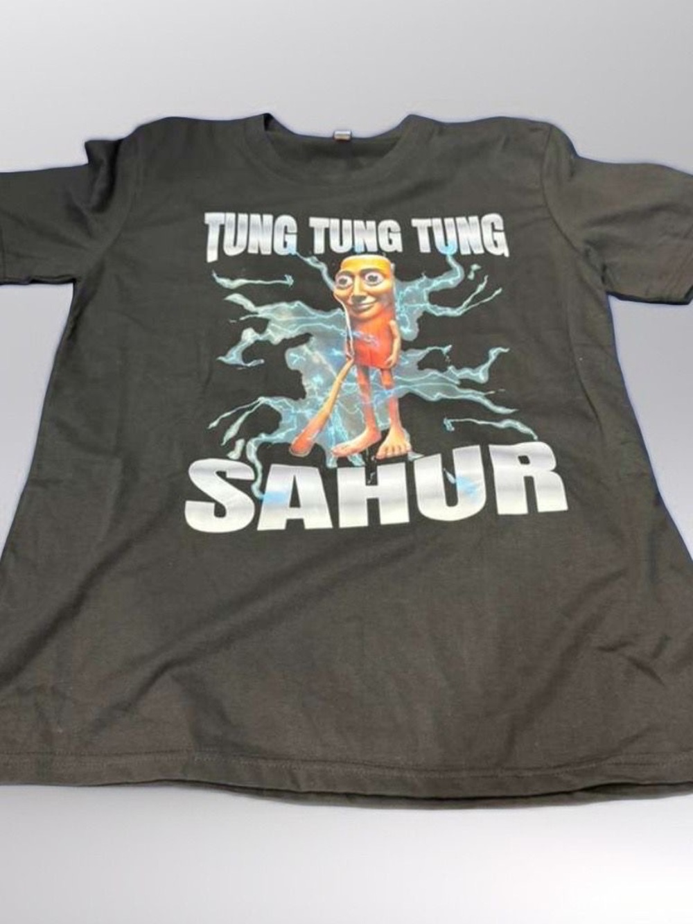 Black Graphic Kids T-Shirt with 'TUNG TUNG TUNG SAHUR' Print